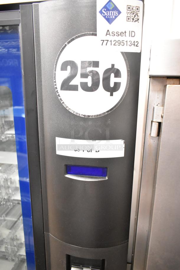 Crane 5800-4 metal drink vending machine with bill acceptor, 115 volts, 1 phase. Features 25¢ price label and Sam's Club asset tag.
