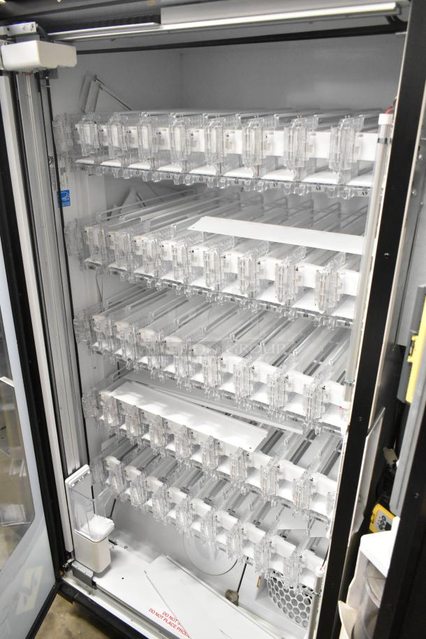 Crane 5800-4 metal commercial drink vending machine, bill acceptor, 115V, 1 phase, multiple shelves, clean condition.