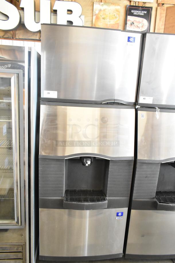 Manitowoc SD0452A ice machine on SPA310 dispenser, stainless steel, 115V, 1 phase, commercial use, shows light wear.