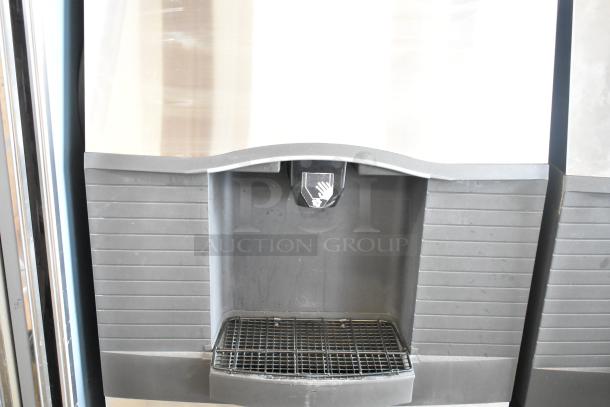 Manitowoc SD0452A ice machine head on SPA310 dispenser, 115V, 1 phase. Stainless steel, commercial use, good condition.