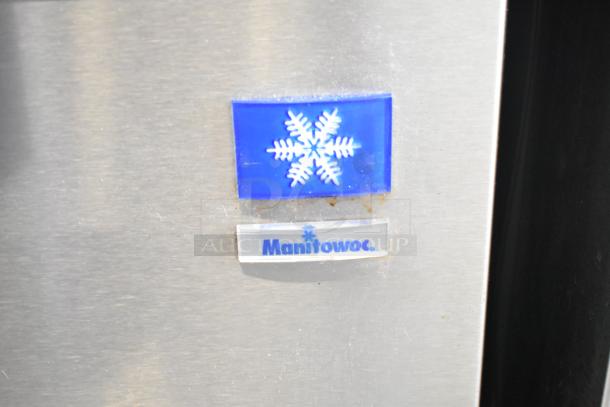 Manitowoc SD0452A ice machine on SPA310 dispenser, 115 volts, 1 phase, stainless steel, with Manitowoc branding.
