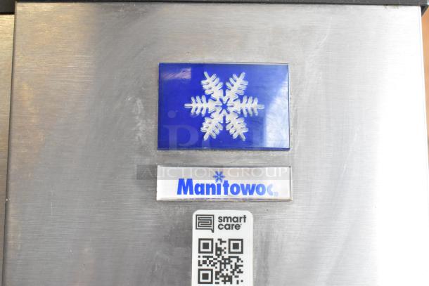 Manitowoc SD0452A ice machine on SPA310 hotel dispenser, stainless steel, 115V, 1 phase, with logo and QR code visible.