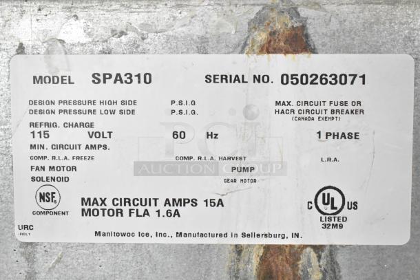 Manitowoc SPA310 label showing voltage 115V, 1 phase, motor FLA 1.6A, serial number 050263071.