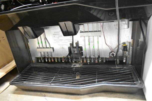 Commercial countertop beverage dispenser, 115 volts, 1 phase, multiple tubing connections, and wiring visible.