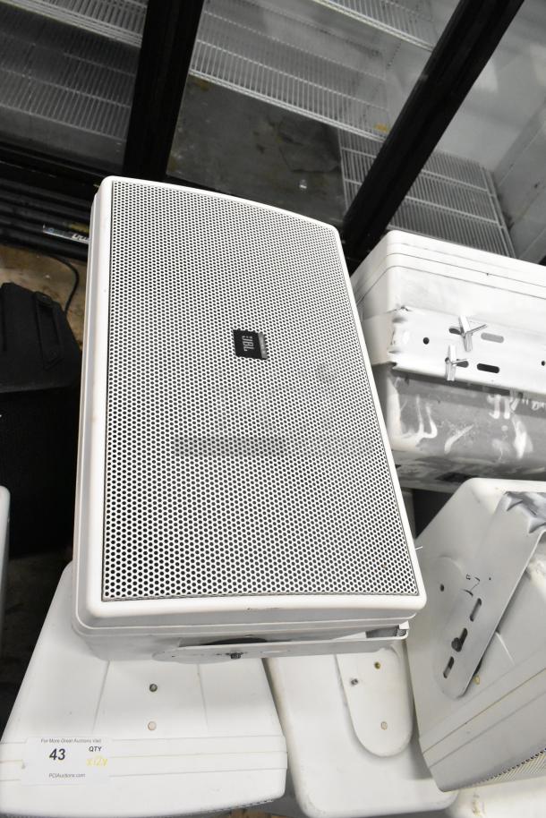 JBL Control 30 speaker, white with perforated grille, good condition. Includes mounting bracket. Part of multi-speaker lot.