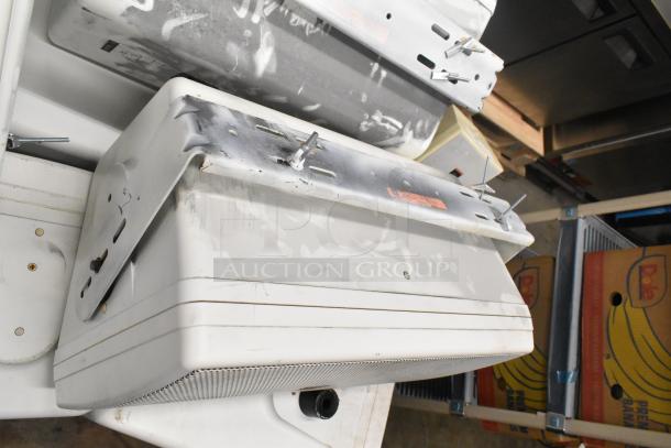 12 various speakers, including JBL Control 30 and Electro-Voice EV ZLX, with mounting brackets, showing wear.