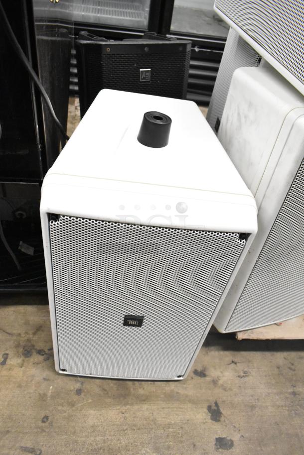 White JBL Control 30 Contractor Series speaker with front grille, among 12 various speakers including Electro-Voice EV ZLX.