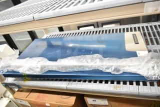 Brand new Hoshizaki self-contained ice maker door, scratch and dent condition, wrapped in protective plastic.