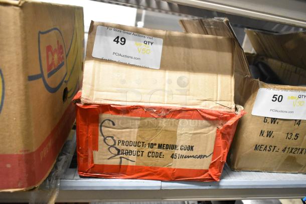 Box labeled "10" Medium Cook" and "Product Code: 451", part of auction lot including 50 stainless steel knives, condition unknown.