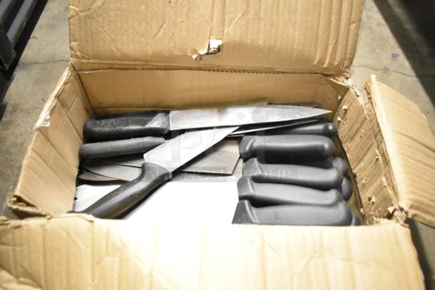 Box of 50 sharpened stainless steel knives with black handles, including a chef knife, in used condition.
