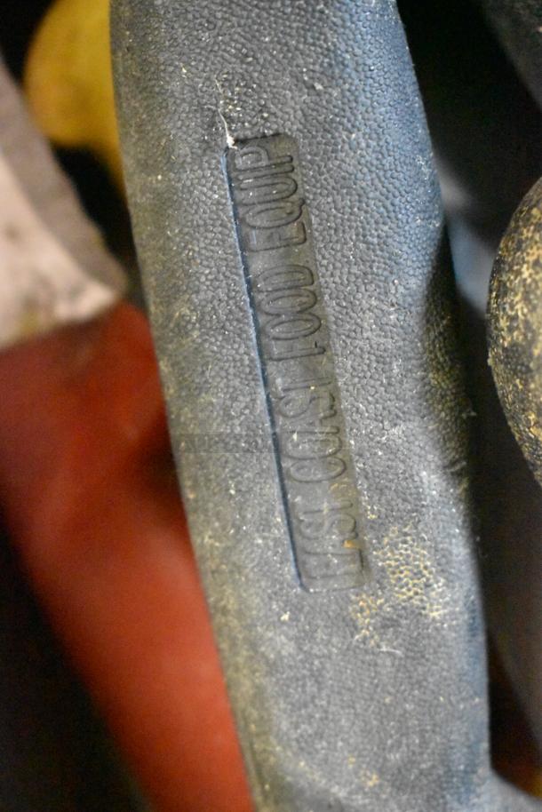 "Close-up of knife handle embossed with 'COAST FOOD EQUIP,' part of a lot of 100 sharpened stainless steel knives."