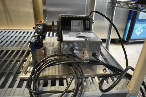 2022 Lancer Carbonator, 115 Volts, 1 Phase. Used condition with visible wiring and metal components. Model label visible.