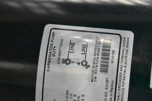 2022 Lancer Carbonator, 115 Volts, 1 Phase. Visible label specifies connections and motor characteristics. In good condition.