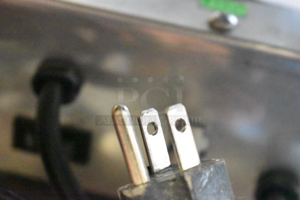 2022 Lancer Carbonator plug, 115 volts, 1 phase, showing prongs and power cord connection.