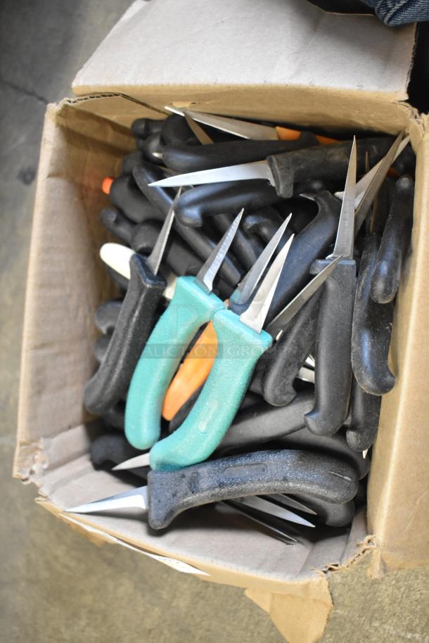 Box of 50 sharpened stainless steel knives with black, green, and orange handles, including a poultry knife.