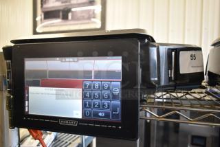 2023 Hobart HTi-7LH4W commercial food scale with digital display. Tested and working, model label visible, model HTi-7LH4W.