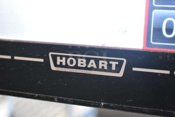 2023 Hobart HTi-7LH4W food portioning scale, tested and working, showing logo and digital display interface.
