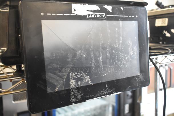 2024 Hobart HTi-7LH4W food portioning scale, visible screen damage, tested and working, 120/208-240V, 1 phase.