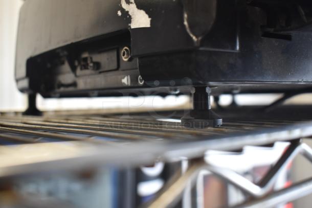 2017 Hobart HTi-7LH26 scale base view, countertop model, screen damage noted, black color, voltage rating visible.