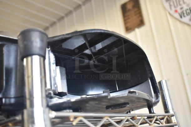 2017 Hobart HTi-7LH26 commercial scale, visible screen damage, 120/208-240V, 1 phase, black and silver finish.