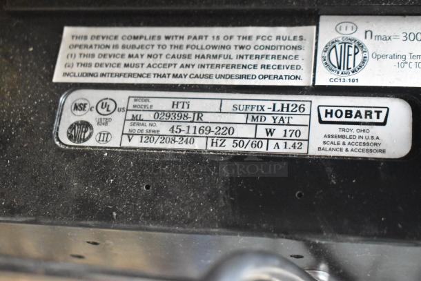 2017 Hobart HTi-7LH26 commercial scale, showing model label. 120/208-240V, 1 Phase. Check images for screen damage.