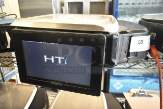2017 Hobart HTi-7LH26 commercial food portioning scale, tested and working. Features digital display. Model visible.