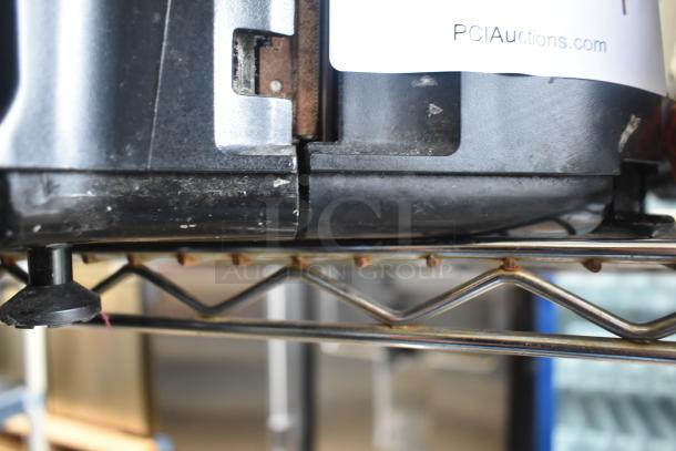 2017 Hobart HTi-7LH26 commercial scale, tested, working. Black casing, visible wear. 120/208-240V, 1 phase.