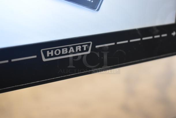 2020 Hobart HTi-7LH4W food portioning scale, black with logo, tested and working, suitable for commercial use.