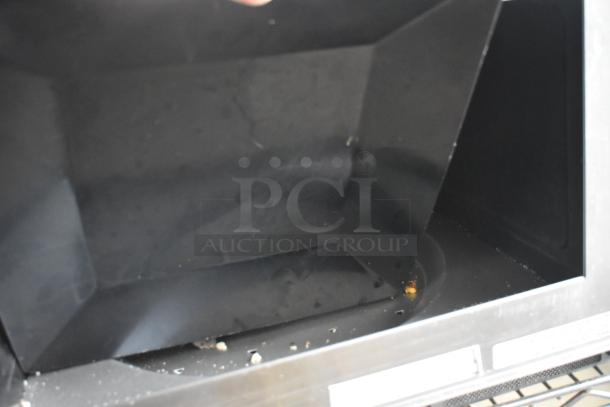 Panasonic NE-17523 Commercial Microwave Oven interior, showing wear. For 208/240V, 1 Phase.