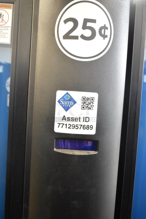 Crane 5800-4 metal commercial vending machine with bill acceptor, 115 volts. Features "25¢" coin slot and Sam's Club asset ID.