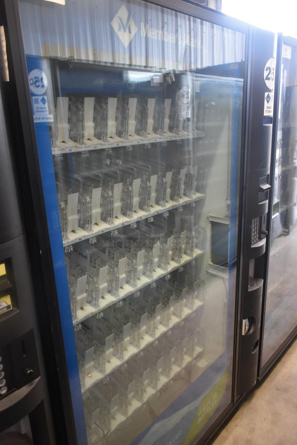Crane 5800-4 metal drink vending machine with bill acceptor, 115 volts, 1 phase, glass front, multiple drink slots.