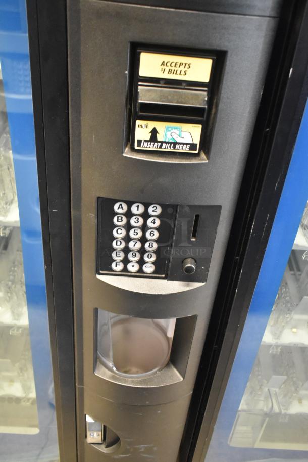 Crane 5800-4 Metal Vending Machine with bill acceptor, keypad, 115 volts, 1 phase, commercial bottled drink dispensing.
