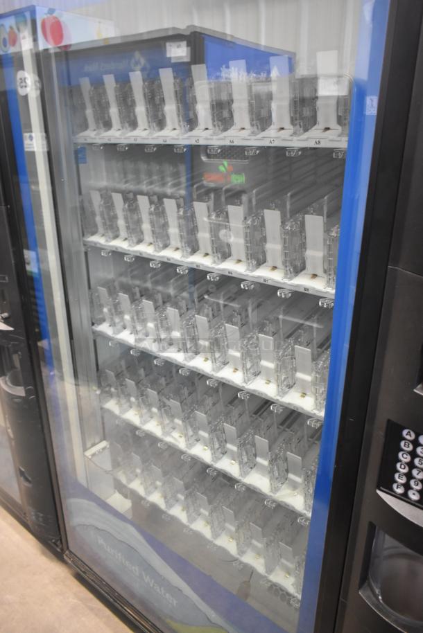 Crane 5800-4 metal drink vending machine, 115 volts, 1 phase, with bill acceptor. Visible clear slots and numeric keypad.
