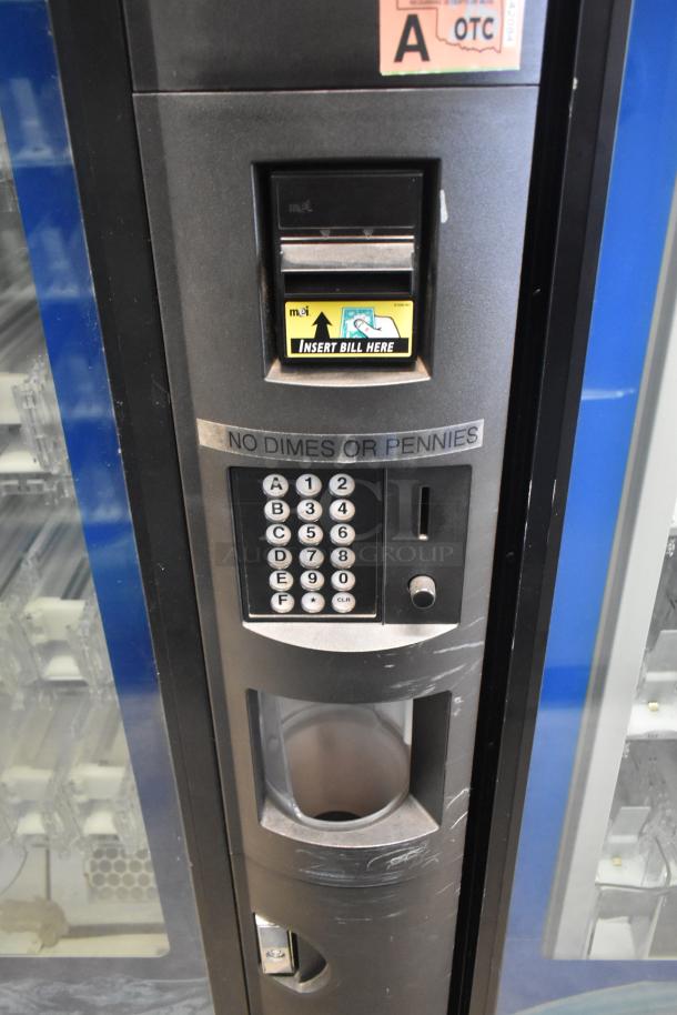 Crane 5800-4 metal vending machine with bill acceptor, keypad, and visible "No Dimes or Pennies" label. 115 volts, 1 phase.