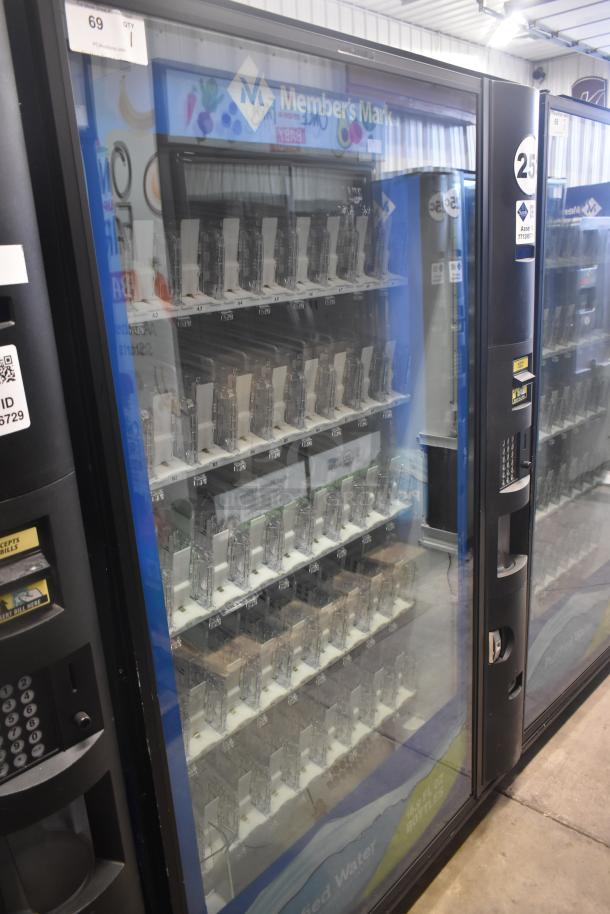 Crane 5800-4 metal drink vending machine with bill acceptor, 115V, 1 Phase. Features glass front and keypad.