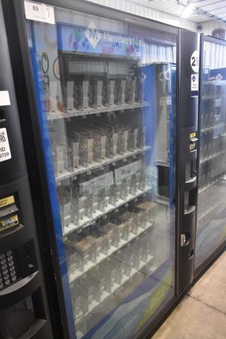 Crane 5800-4 metal drink vending machine with bill acceptor, 115V, 1 Phase. Features glass front and keypad.