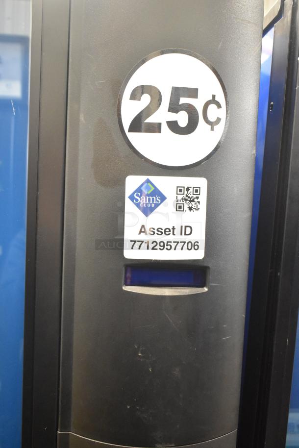 Crane 5800-4 metal vending machine with bill acceptor, 25¢ price label, asset ID 7712957706 visible. 115V, 1 Phase.