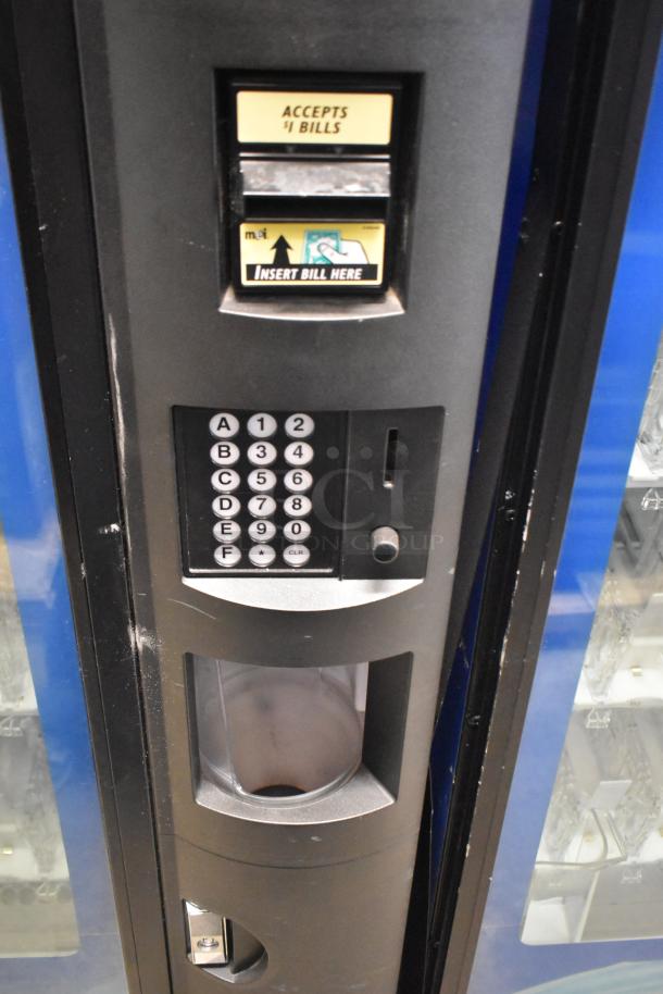 Crane 5800-4 metal commercial drink vending machine with bill acceptor, keypad, and selection panel. 115V, 1 phase.