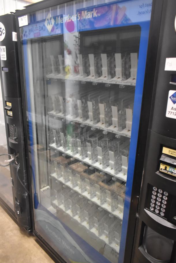 Crane 5800-4 metal commercial drink vending machine with bill acceptor, 115V, 1-phase; features multiple shelves for bottled drinks.
