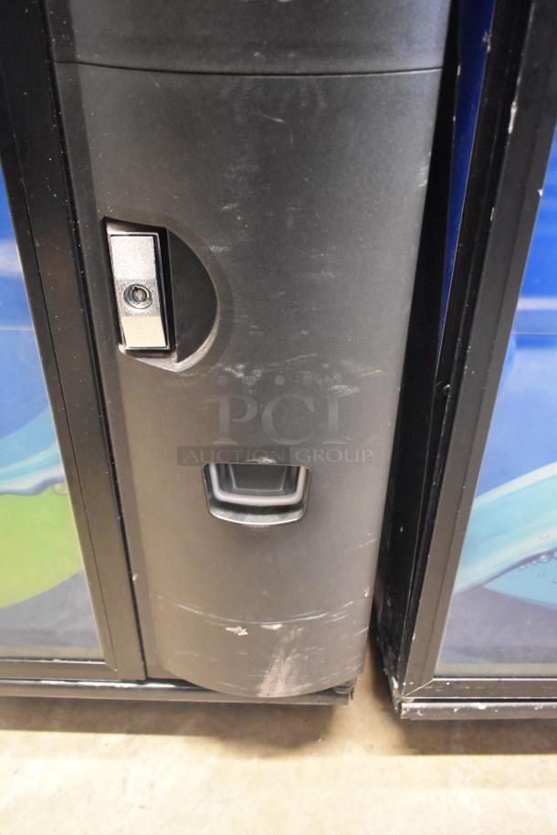 Crane 5800-4 metal commercial drink vending machine with bill acceptor, 115 volts, showing minor wear.