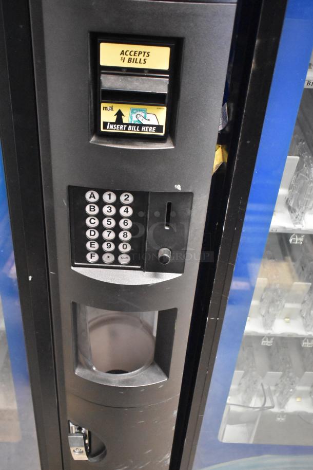 Crane 5800-4 metal drink vending machine with bill acceptor, keypad, 115V, 1 phase, accepts $1 bills. Commercial use.