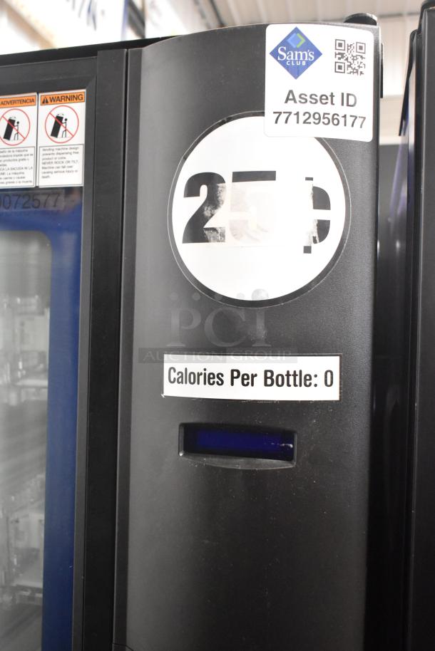 Crane 5800-4 vending machine with bill acceptor, 115V, 1 phase. Features labels indicating pricing and calorie info.