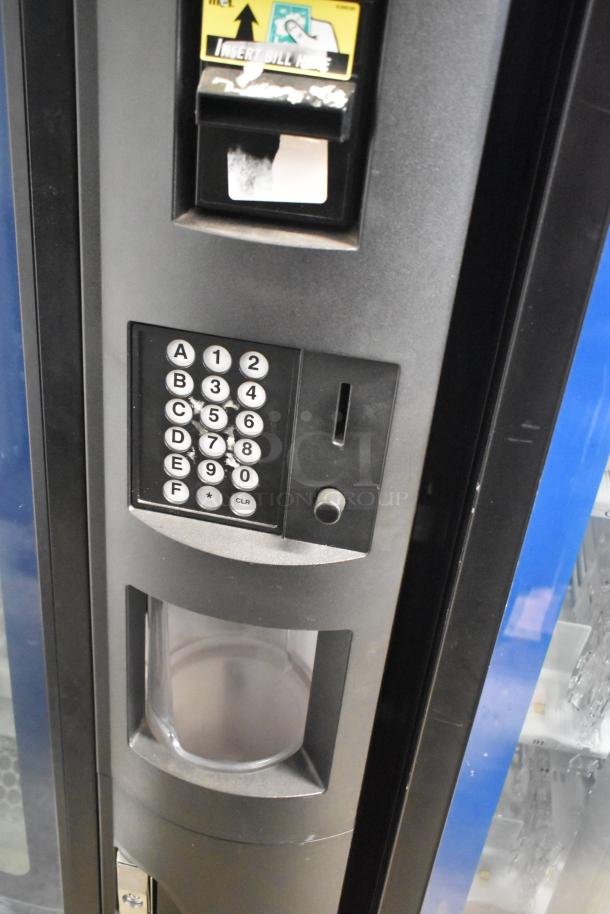 Crane 5800-4 commercial drink vending machine with bill acceptor, keypad, and coin slot. 115 volts, 1 phase.