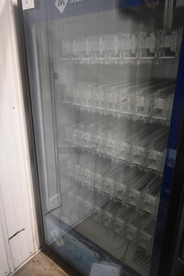 Crane 5800-4 metal drink vending machine with bill acceptor, 115 volts, 1 phase, empty slots, good condition.