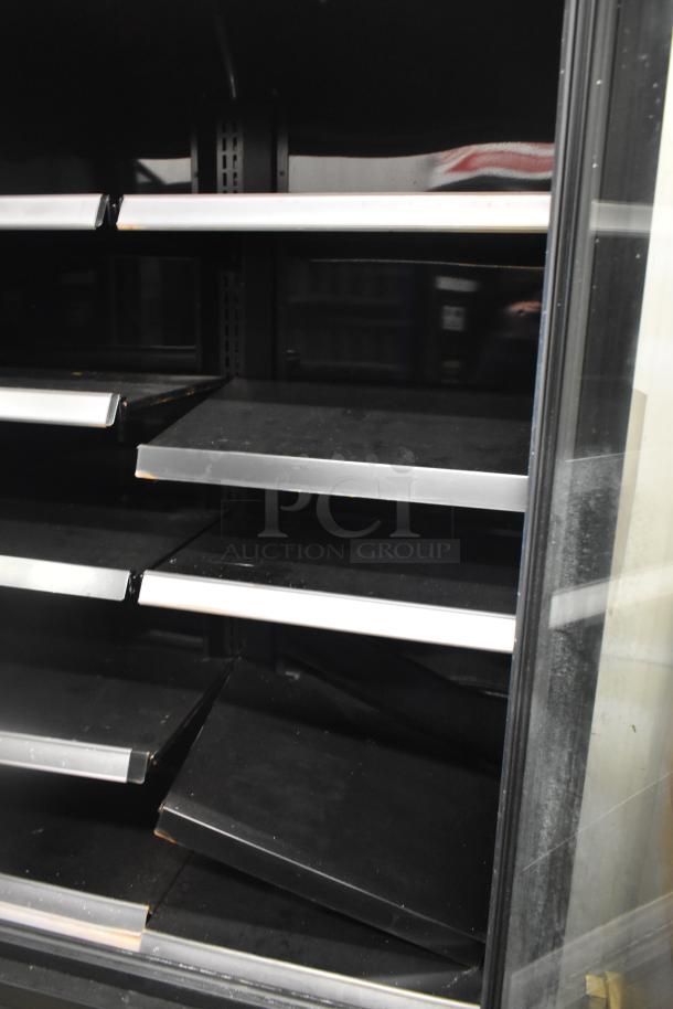 2021 True TVM-48SL-HC commercial two-door reach-in cooler merchandiser with shelves, 115 volts, 1 phase.