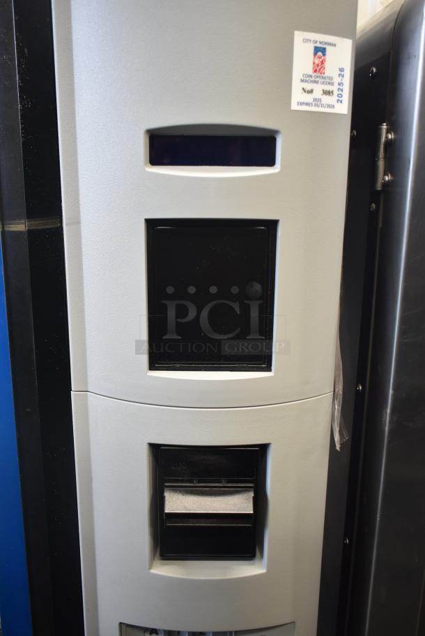 Crane 5800-4 commercial drink vending machine, metal, with bill acceptor, license sticker visible, good condition.