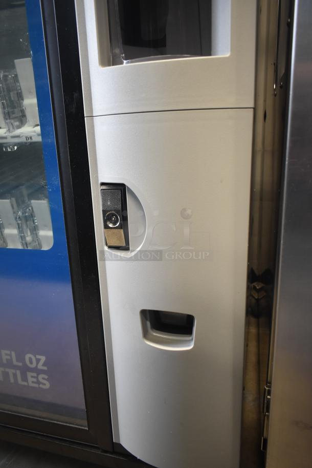 Crane 5800-4 metal drink vending machine with bill acceptor, 115V, 1-phase, beige and blue, features secure lock.