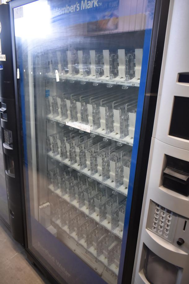 Crane 5800-4 metal commercial vending machine, accommodates bottled drinks, bill acceptor, 115V, 1 phase, good condition.
