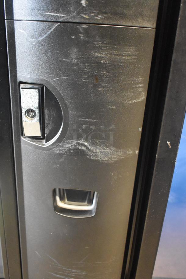 Crane 5800-4 commercial drink vending machine with bill acceptor. Visible wear. Model 5800-4, operates on 115 volts.