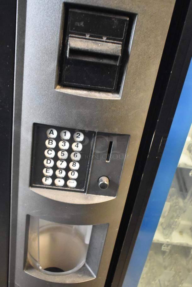 Crane 5800-4 metal commercial drink vending machine with bill acceptor, keypad, and coin slot. 115 volts, 1 phase.